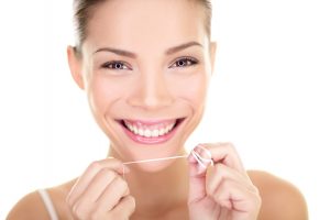 Flossing everyday helps with a great smile